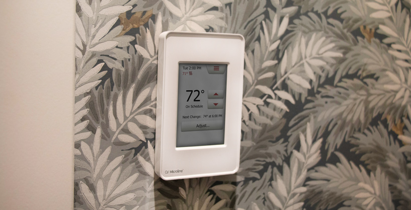 WarmTemps thermostat pictured on wall